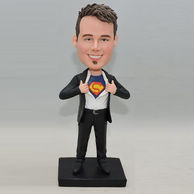 Superman bobblehead in black suit