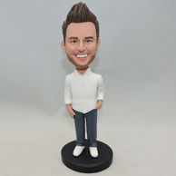 Smiling boy bobblehead with white shirt and dark blue pants