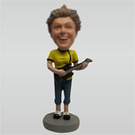 Custom female and guitar bobble heads