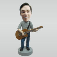 Custom man and guitar bobblehead doll