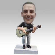 Custom man and guitar bobblehead dolls