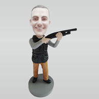 Personalized custom man and big gun bobbleheads