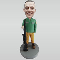 Personalized custom man and big gun bobble heads