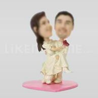 Custom bobblehead dolls of wedding cake toppers