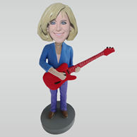 Custom woman and guitar bobbleheads