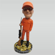 Custom man and gun bobblehead doll