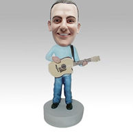 Personalized custom man and guitar bobbleheads