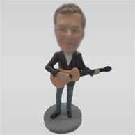 Custom man and guitar bobbleheads