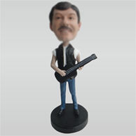 Custom man and guitar bobble heads