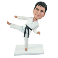 Cool coach playing taekwondo bobble heads