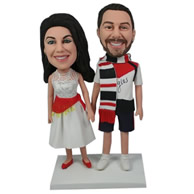 Custom young couple in fashionable clothing hand in hand bobble heads