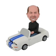 Custom bald on the top of head sitting inide a convertible car bobble heads