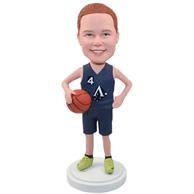 Custom red hair girl in sports suit holding basketball in arms bobble heads