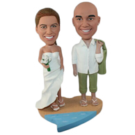 Custom mixed-race new couple having wedding on beach bobble heads