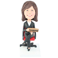 The sitting on the sofa of woman managers custom bobbleheads