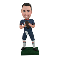 The man is a football players custom bobbleheads