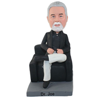 The man sat on the sofa custom bobbleheads