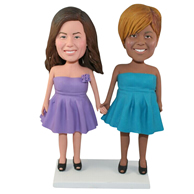 The two women in the skirt custom bobbleheads