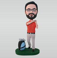 Glasses man in orange T-shirt playing golf custom bobbleheads