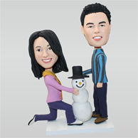 Custom couple bobblehead wth snow