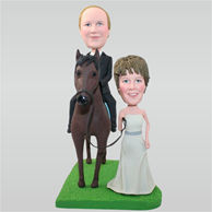 Bride in white wedding dress and groom in suit riding on a horse custom bobbleheads