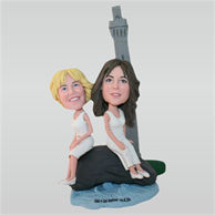 Yellow hair woman and brown hair woman sitting on the rock custom same sex bobbleheads