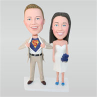 Super groom in beige suit and bride in white wedding dress holding a bunch of flowers custom bobbleheads