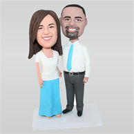 Husband in white shirt and wife in blue dress custom bobbleheads