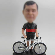 Bicycle with man bobble head doll