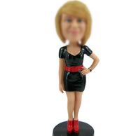 Bobble head doll of black dress