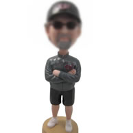 Bobble head doll of Coach