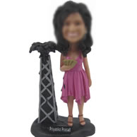 Custom bobbleheads of pink dress