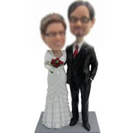 Custom bobbleheads of  Wedding cake