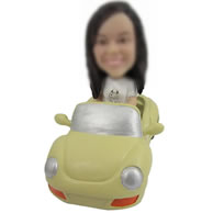 Custom car with girl bobbleheads