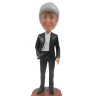 Man in suit bobble head doll