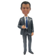 Man in suit bobblehead doll