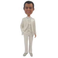 Man in white suit bobblehead doll