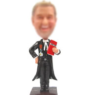 Man with book bobbleheads