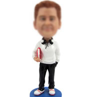 Man with book bobbleheads