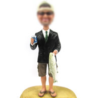 Man with fish bobbleheads