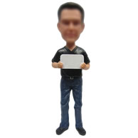 Man with ipad bobbleheads