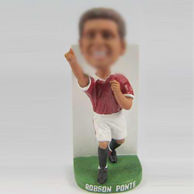 Football player bobble head doll