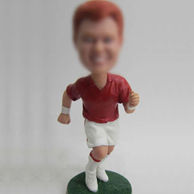 Football player bobblehead