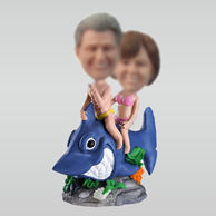 Personalized custom Couple riding a whale bobbleheads