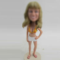 Travel bobble head doll