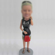 Woman bobblehead doll