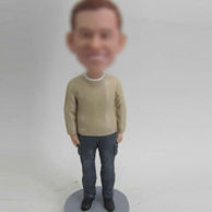 Yellow Sweater bobble head doll